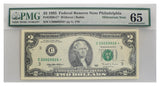 $2 1995 PMG graded Federal Reserve Star Note GEM uncirculated 65 - Philadelphia